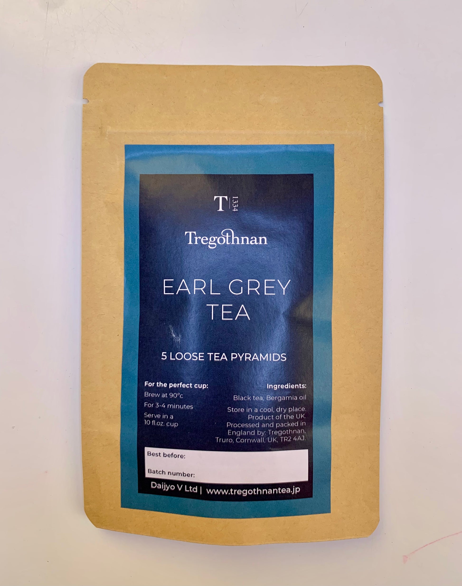Tregothnan branded pouch with Earl Grey 5 pyramid bags on a clear background