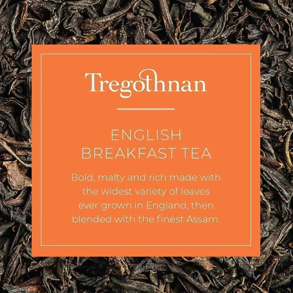 Orange Tregothnan English Breakfast Tea label on loose leaf background.