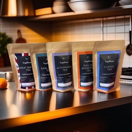 Range of Tregothnan tea varieties in branded packaging displayed on kitchen counter.